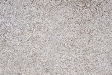 Wall plaster background texture. White color rough material