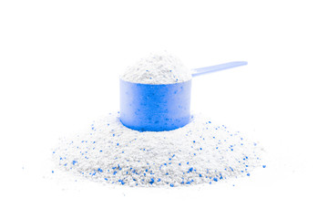 Clean detergent. Wash powder texture in cup or scoop for washing machine isolated on white. Liquid soap laundry background. Eco style cleaning concept.