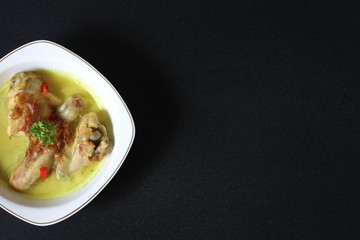 chicken typical opor indonesia isolated on background