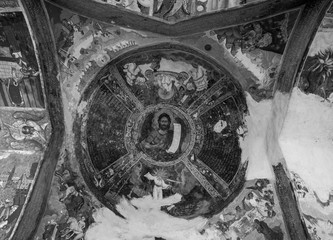 the walls of the Christian church painted with saints