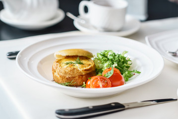 eggs benedict with fresh salad