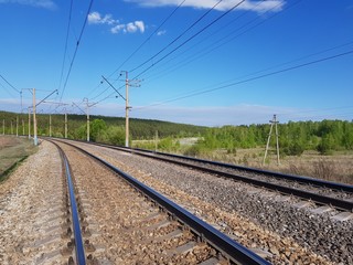 Fototapeta na wymiar The railway goes to the horizon