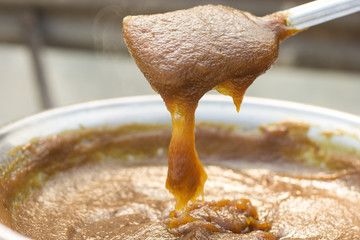 Mango paste for mango sheet snack cooking. Healthy homemade mango fruit preservation