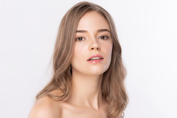 Fototapeta premium Beauty Woman face Portrait, Beautiful Young Woman with Clean Fresh Healthy Skin, Facial treatment. Cosmetology, beauty and spa, isolated on white background.