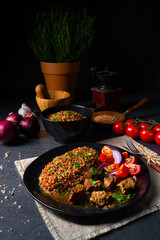 Buckwheat groats baked in the oven with beef goulash