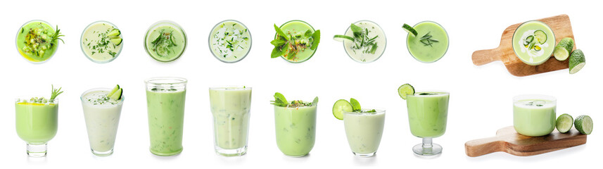 Many glasses of cold cucumber soup on white background