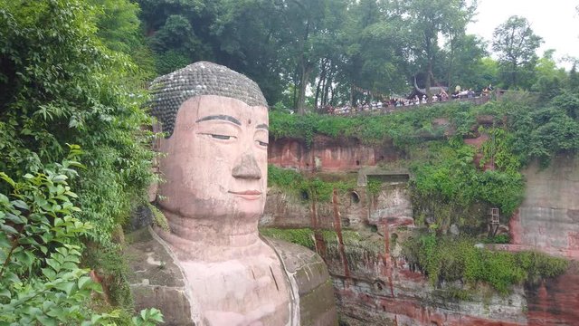 The Head of Giant Leshan Buddha, a 71m tall stone statue built at the confluence of Minjiang, Dadu and Qingyi rivers, Sichuan, China