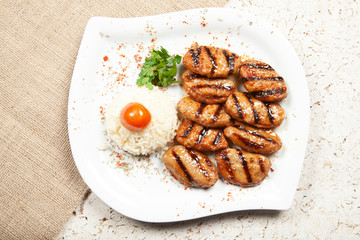 fried meatballs and rice pilaf
