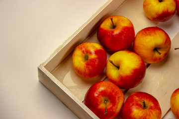 red apples in a box