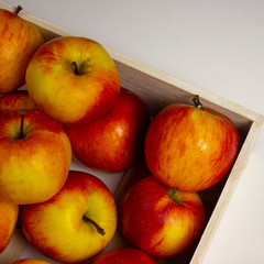 red apples on a wooden table