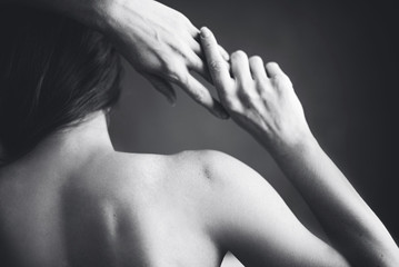 naked woman with hands on hips