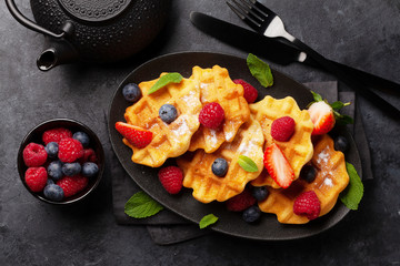 Delicious belgian waffles with summer berries