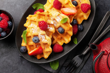 Delicious belgian waffles with summer berries