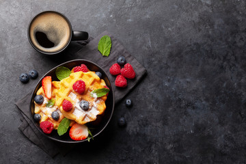 Delicious belgian waffles with summer berries