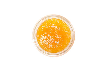 Glass jar with apricot jam isolated on white background