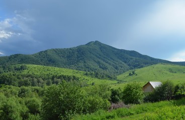 Fototapeta na wymiar mountain landscape with a house