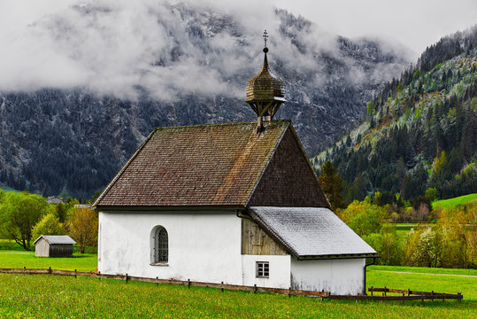 St. Leonhard chapel in Tannheim (Tirol, Austria) at spring sunrise