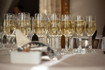 Table with glass champagne glasses