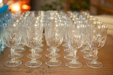 Rows of empty crystal glasses