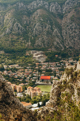 Fototapeta na wymiar Beautiful view of houses in gorge among mountains, Montenegro