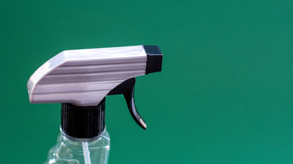 Close-up of the top of a bottle of liquid detergent with a dispenser for cleaning the home and office. The concept of hygiene and cleanliness. Copy space