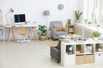 Image of modern living room with workplace and modern furniture in the house