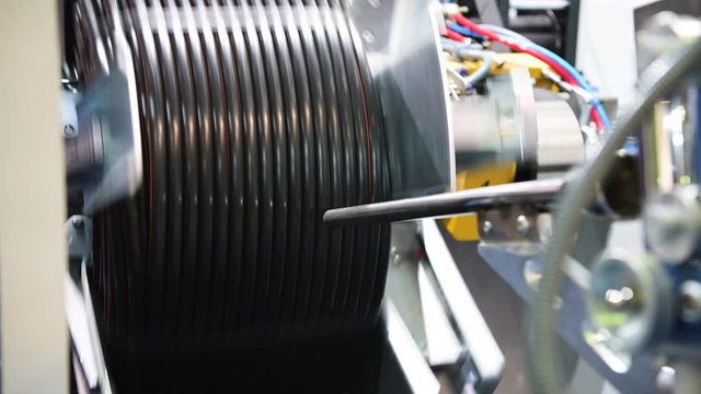 Spinning reel with cable. Production of electric cable