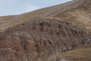 Barren mountains on rocky desert landscape