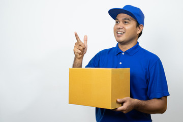 Blue Delivery handsome asian man holding parcel cardboard box on isolated white background.