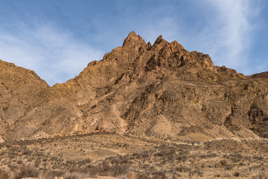 Barren mountains on rocky desert landscape