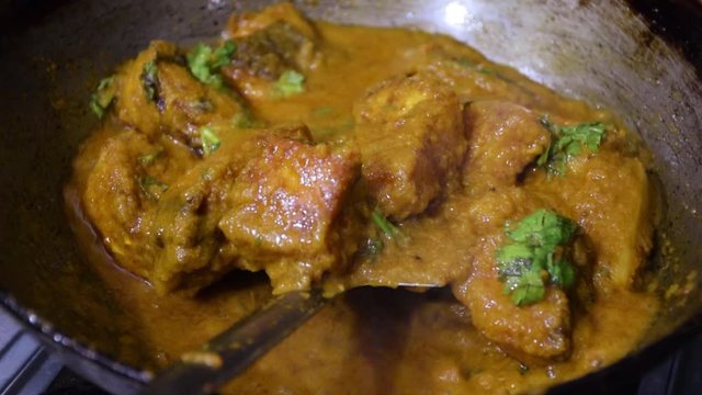 Bengali traditional Rohu fish curry (Labeo Rohita Curry) preparation in progress which is also called as Rui Macher Jhol in Bengali Language
