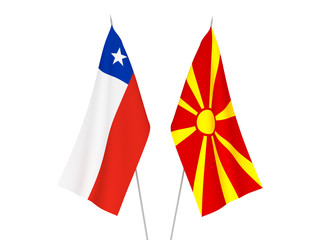 National fabric flags of North Macedonia and Chile isolated on white background. 3d rendering illustration.