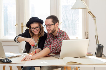 Freelance working from home - several people doing job remotely using laptop.