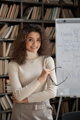 Happy hispanic ethnic young woman university teacher, smiling latin girl college student,...