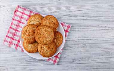 delicious cookies on a white wooden board