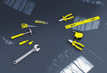 Many yellow hand tools on a black background, there is space for your ad in the center.