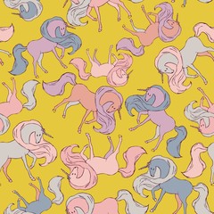 Fototapeta premium Graceful seamless pattern with blue horses on a light beige, cream background. Vector illustration with ink drawn unicorns