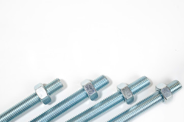 Bolts, steel galvanized with hex heads on white background