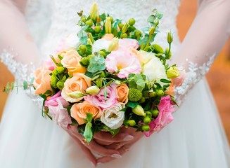 wedding bouquet in bride hands