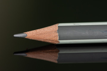 white gray pencil in high resolution isolated on  black background 