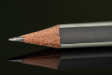 white gray pencil in high resolution isolated on  black background 