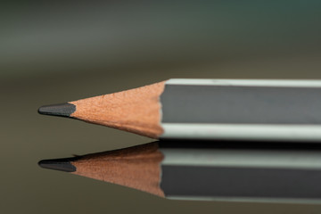 white gray pencil in high resolution isolated on  black background 