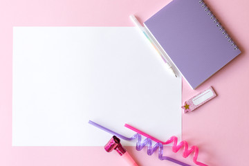 Colorful pink background with party decoration, notebook and free space for text, mock-up. Top view. Learning to draw, making wish list, events or plans.