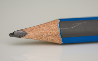 Obraz premium blue gray pencil in high resolution isolated on black background