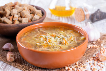 Pea soup with on table background