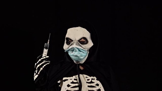 skull covid and vaccine.
