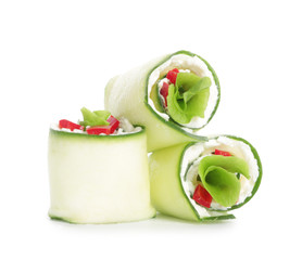 Tasty cucumber rolls on white background