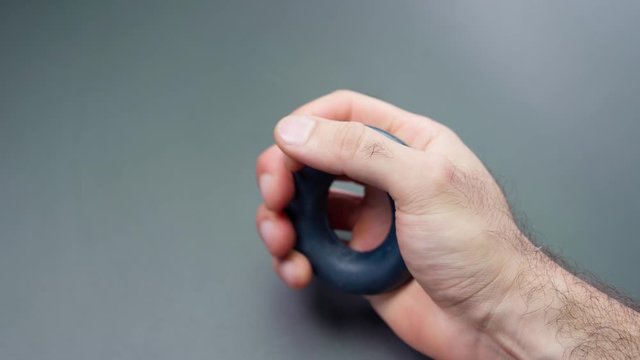 Exercise. Hand squeezing the espander