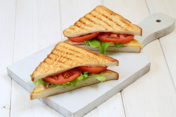 sandwich with ham and vegetables