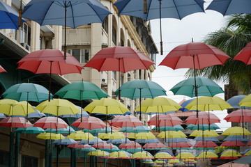 Fototapeta na wymiar Umbrellas in the street